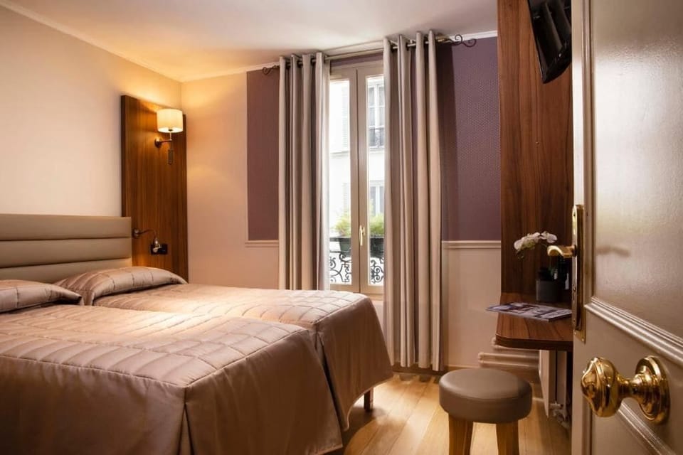 Economy Twin Room | Iron/ironing board, free cribs/infant beds, free WiFi, bed sheets