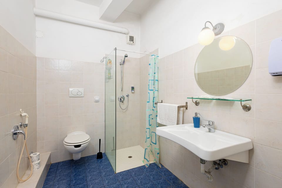 Single Room, Shared Bathroom | Bathroom | Hair dryer, slippers, bidet, towels