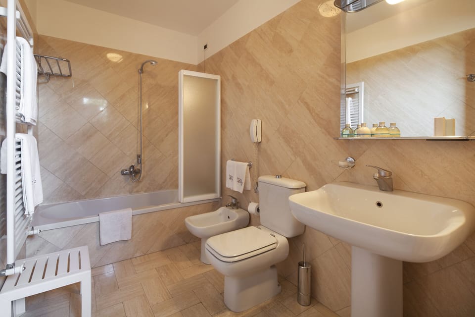 Rainfall showerhead, free toiletries, hair dryer, bathrobes