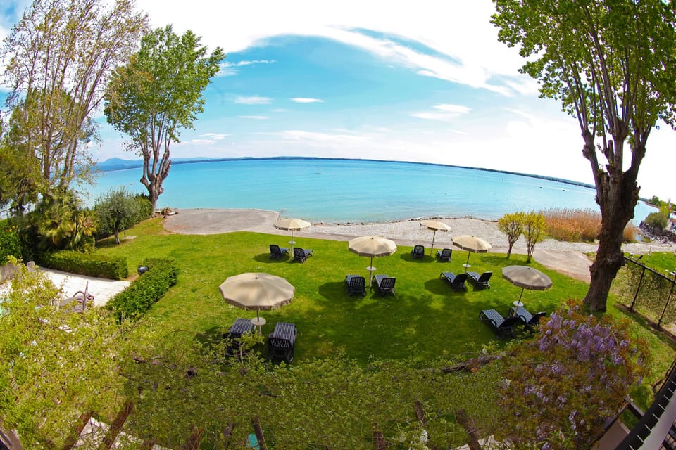 Panoramic Double Room, Balcony, Lake View | In-room safe, blackout drapes, free WiFi, bed sheets