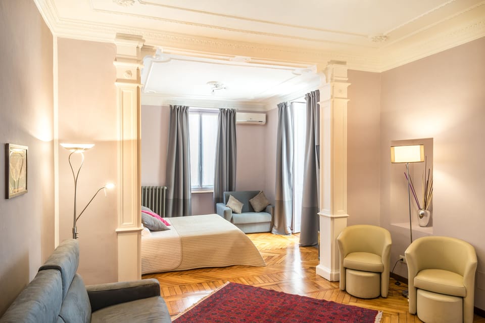 Comfort Quadruple Room | Minibar, in-room safe, desk, blackout drapes