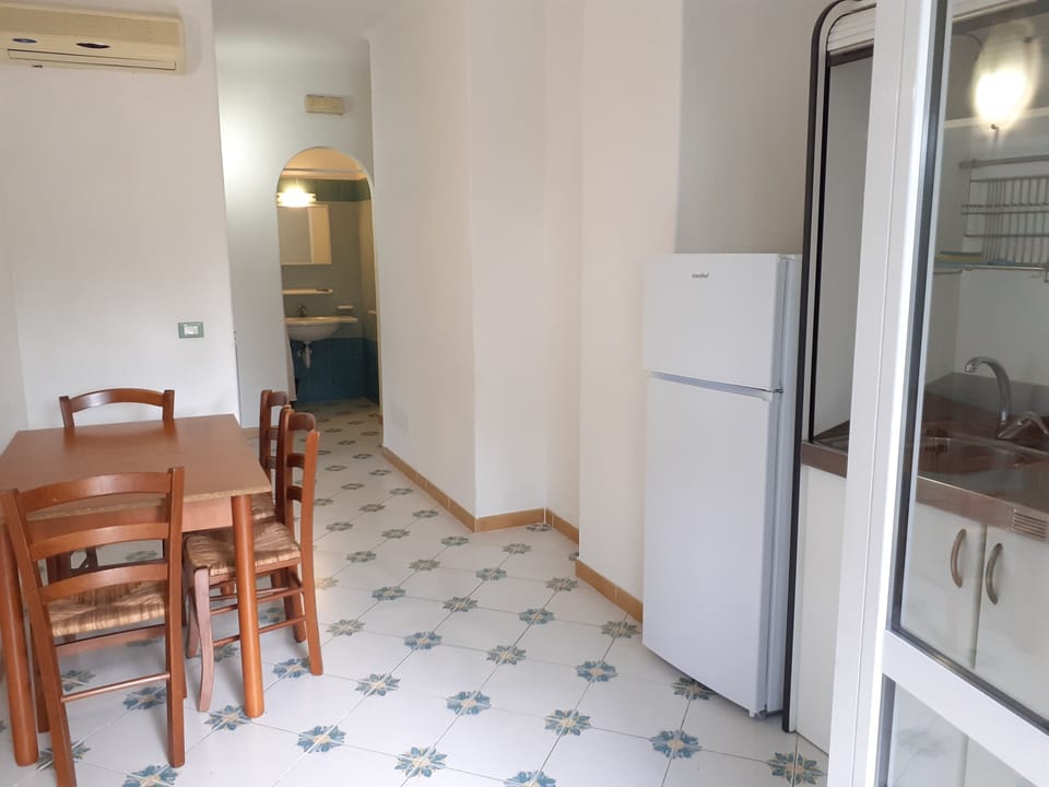 Family Apartment | Living area | 24-inch flat-screen TV with digital channels