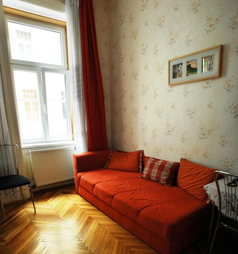 Triple Room | Living area | 80-cm flat-screen TV with cable channels, TV