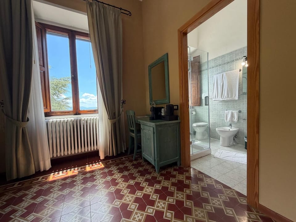 Deluxe Double Room, Hill View | Bathroom | Shower, free toiletries, hair dryer, slippers