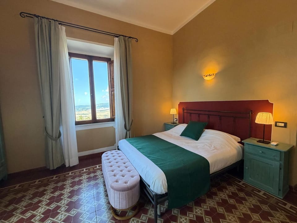 Deluxe Double Room, Hill View | Minibar, in-room safe, desk, laptop workspace