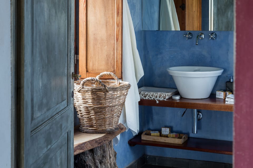 Design Suite, 1 King Bed, Hill View | Bathroom | Shower, free toiletries, hair dryer, bathrobes