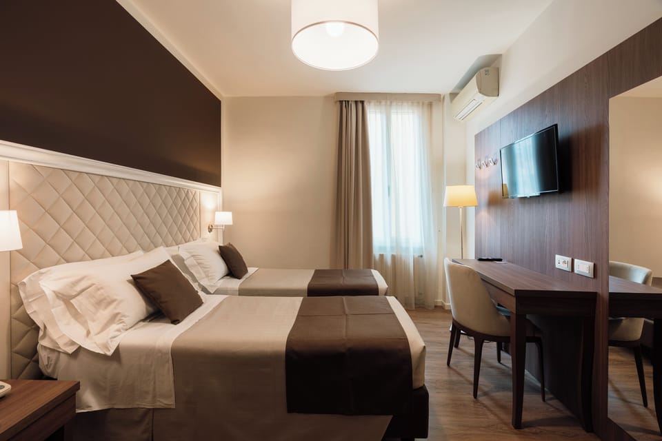 Classic Double or Twin Room | Minibar, in-room safe, desk, free WiFi