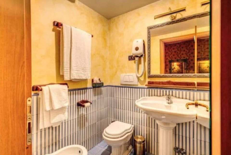 Free toiletries, hair dryer, bidet, towels