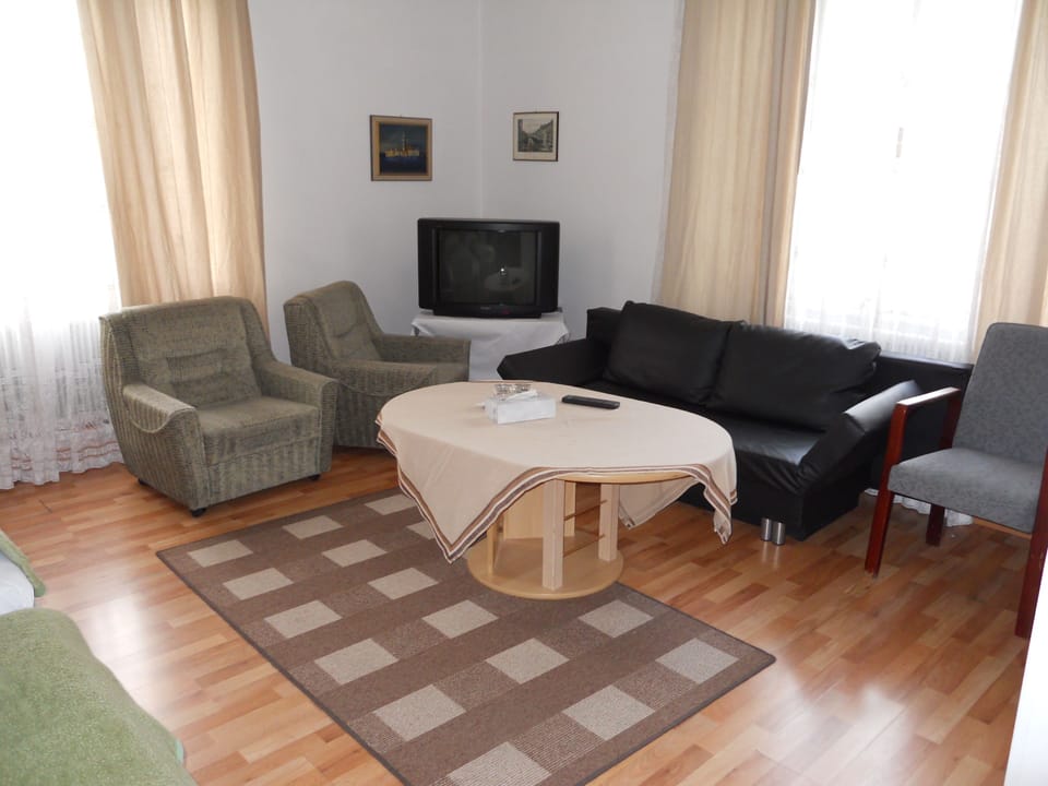 Economy Quadruple Room | Desk, blackout drapes, iron/ironing board, free WiFi