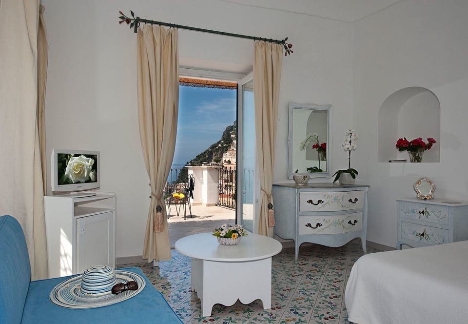 Apartment (Two Bedroom, Sea View) | Minibar, in-room safe, desk, blackout drapes