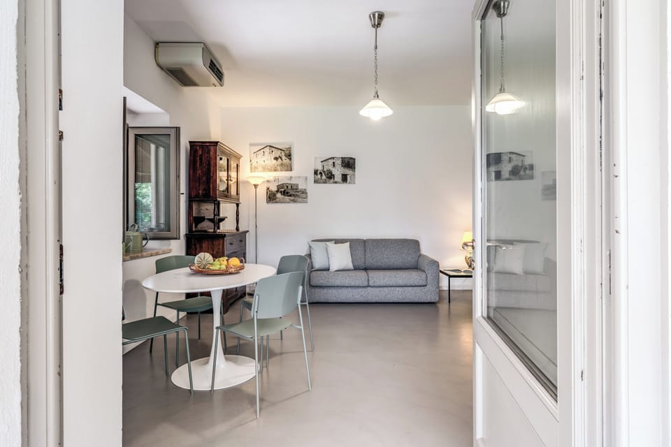 Family Apartment, Tower | Living area | 23-inch flat-screen TV with digital channels, TV, printers