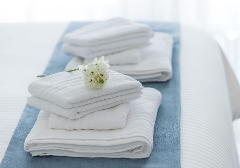Down comforters, memory foam beds, in-room safe, blackout drapes