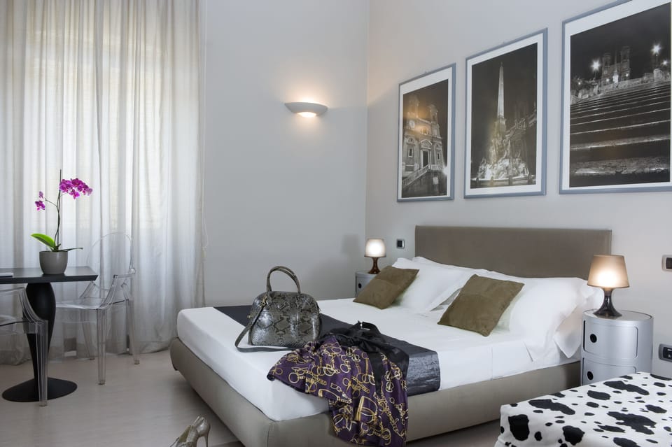 Egyptian cotton sheets, premium bedding, down comforters, free minibar