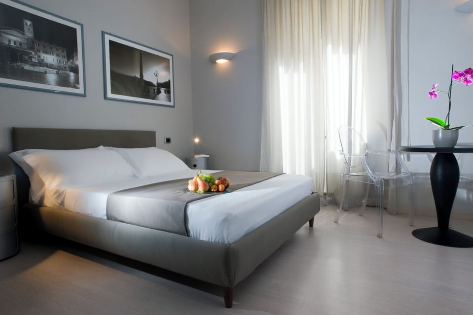 Egyptian cotton sheets, premium bedding, down comforters, free minibar