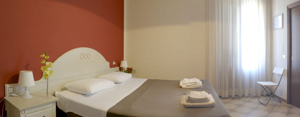 Double Room, Private Bathroom | Down comforters, desk, free WiFi, bed sheets