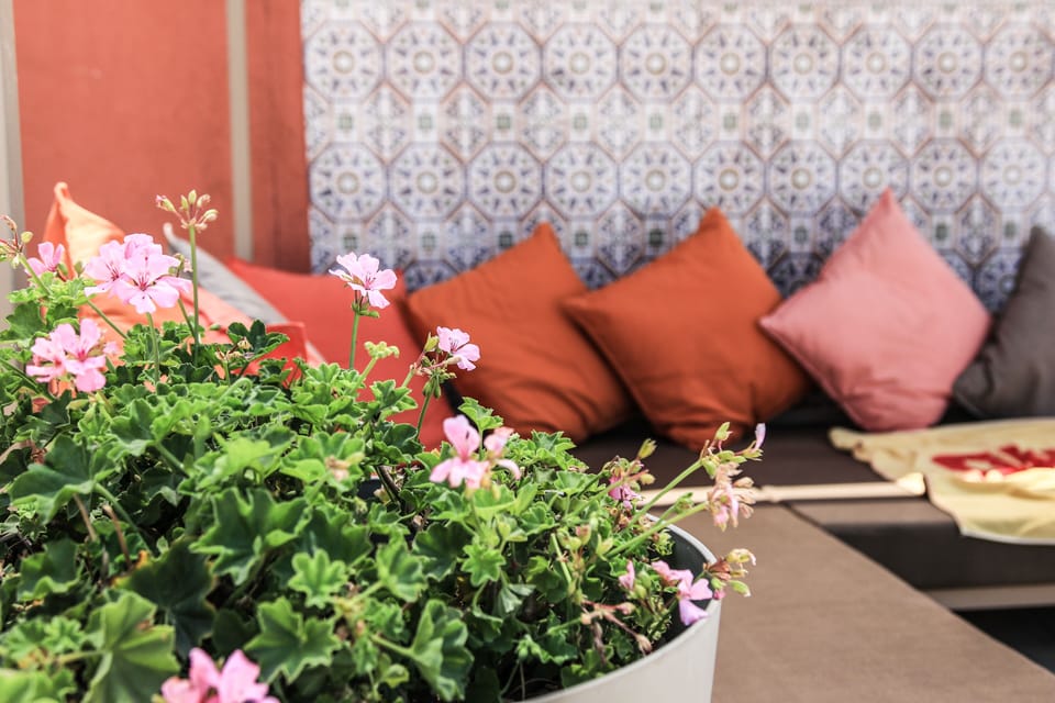 Seasonal outdoor pool, open 10:00 AM to 7:30 PM, pool umbrellas