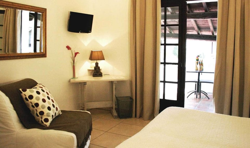 Double Room | Minibar, in-room safe, desk, blackout drapes