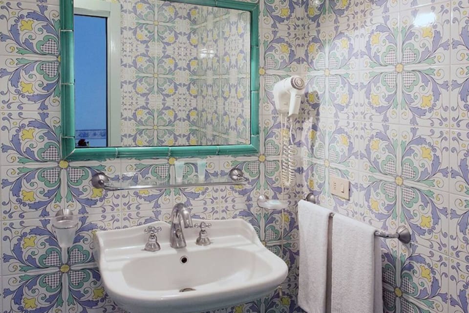 Triple Room, Terrace, Partial Sea View (Terrace) | Bathroom | Shower, free toiletries, hair dryer, slippers