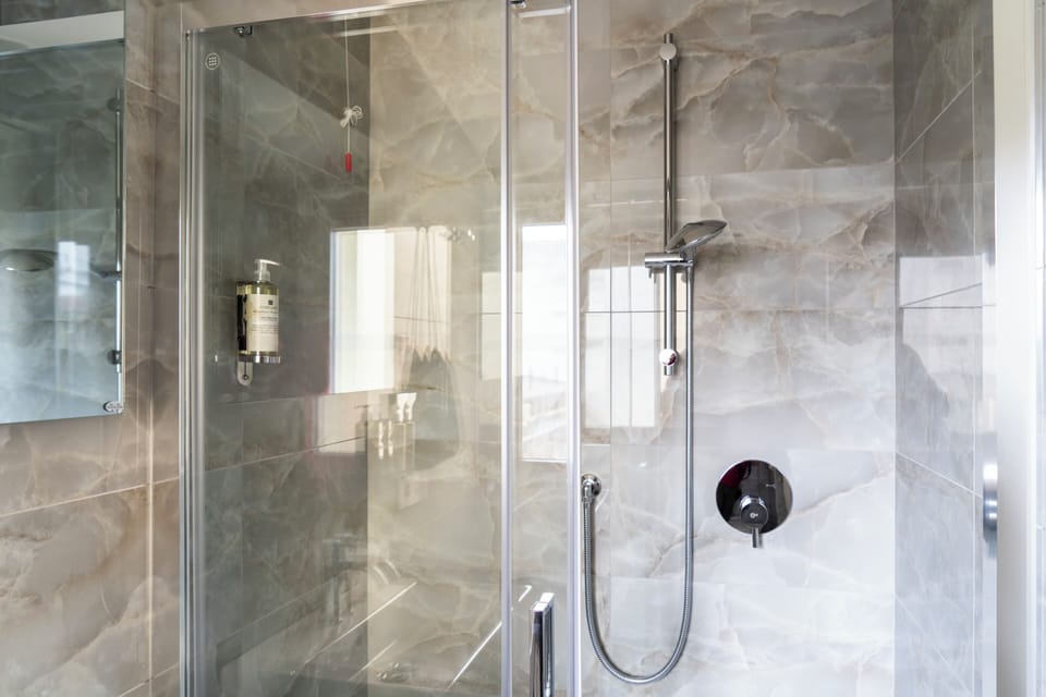 Luxury Room, Private Bathroom | Bathroom | Shower, free toiletries, hair dryer, bidet