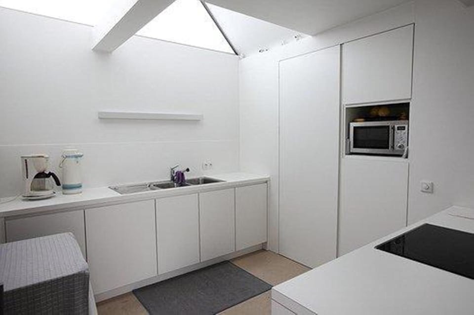 Fridge, coffee/tea maker, cookware/dishes/utensils