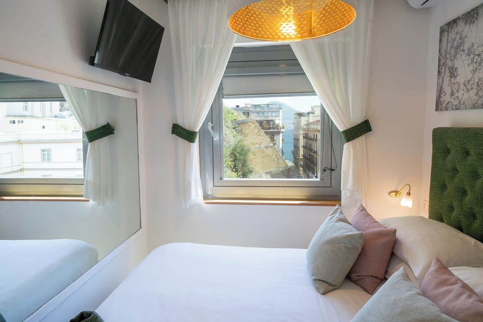 Superior Quadruple Room | Down comforters, minibar, in-room safe, desk