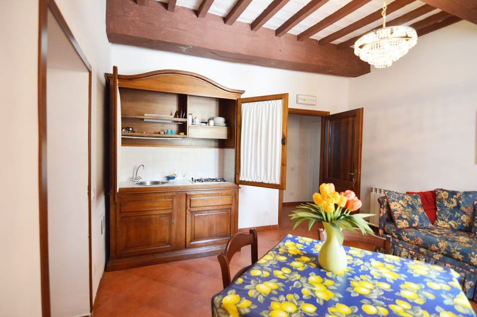 Apartment | Private kitchenette | Fridge, stovetop, coffee/tea maker, dining tables