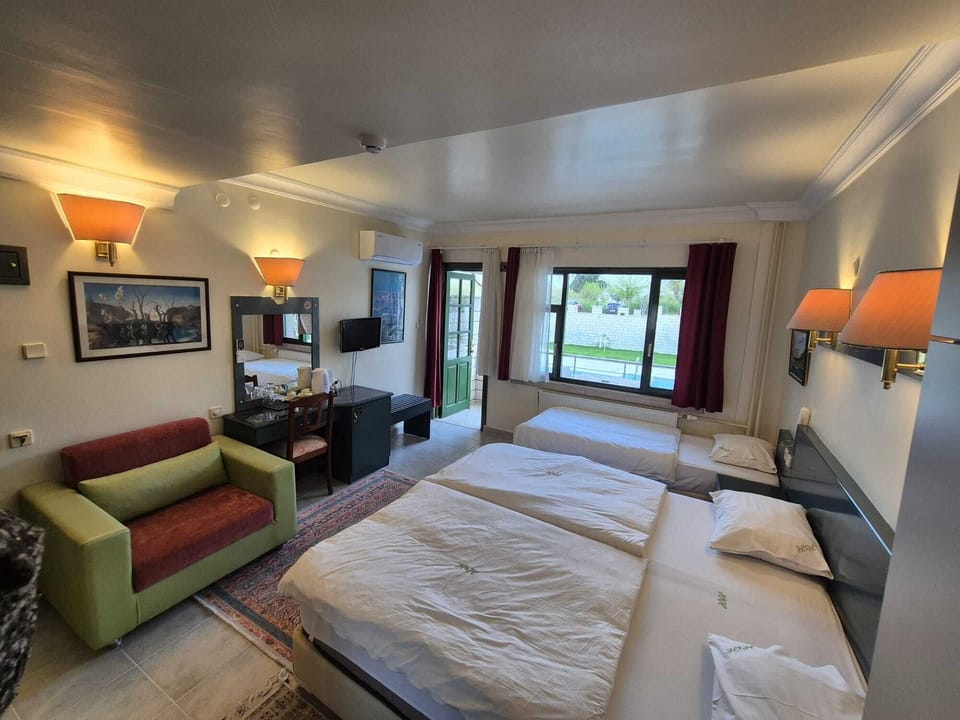 Panoramic Triple Room, Balcony, Poolside | Egyptian cotton sheets, premium bedding, minibar, in-room safe