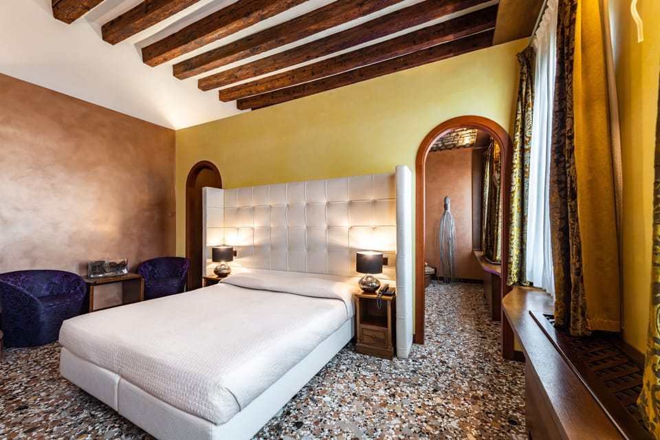 Suite, City View | Minibar (some free items), in-room safe, desk, soundproofing