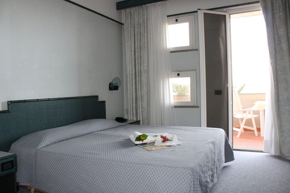 Hypo-allergenic bedding available, memory foam beds, in-room safe, desk