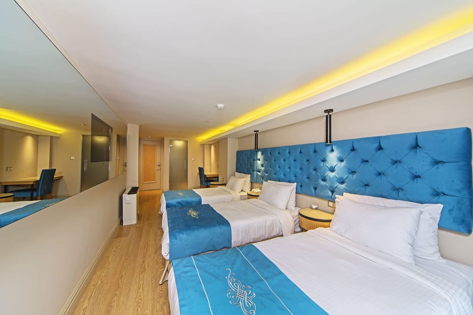 Standard Triple Room | Minibar, in-room safe, soundproofing, WiFi (free)