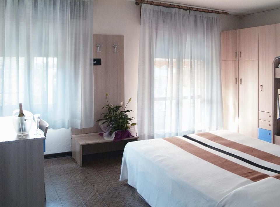 Quadruple Room | In-room safe, blackout drapes, iron/ironing board (on request)