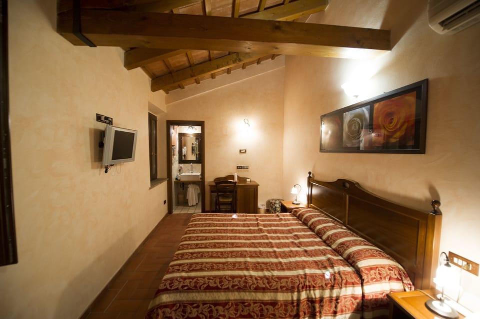 Down comforters, pillowtop beds, minibar, desk