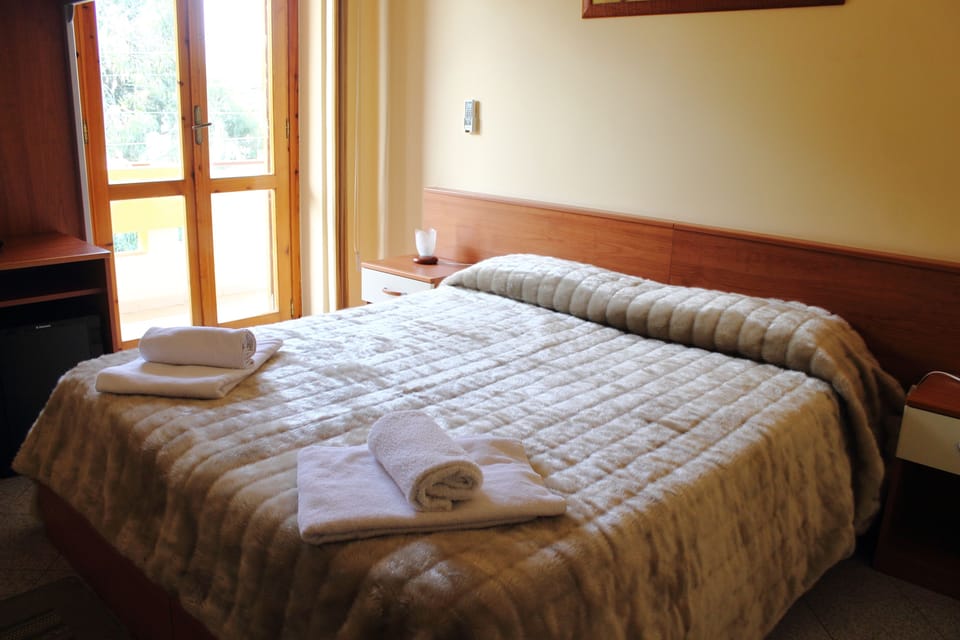 Quadruple Room | Frette Italian sheets, memory foam beds, minibar, desk