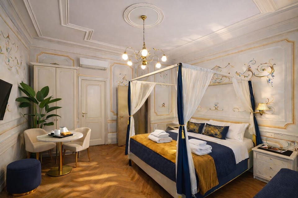 Royal Quadruple Room (GOLDONI) | Egyptian cotton sheets, pillowtop beds, in-room safe