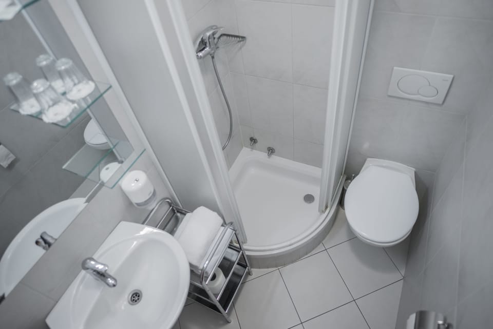 Shower, hair dryer, bathrobes, towels