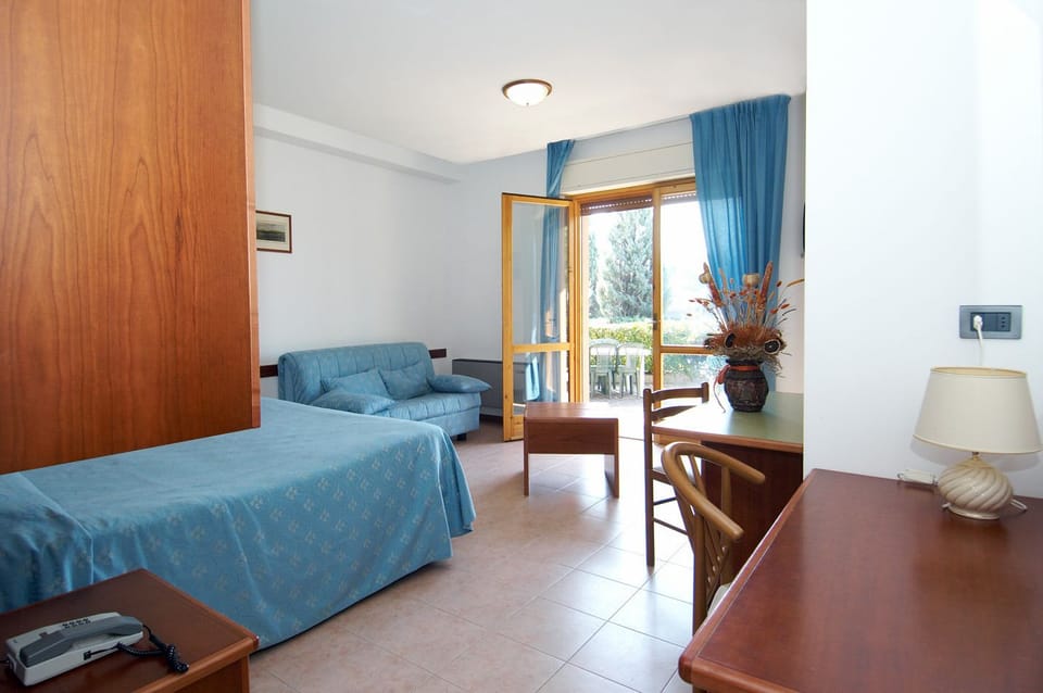 Family Room, 2 Bedrooms, Partial Lake View | Desk, free WiFi, bed sheets, wheelchair access