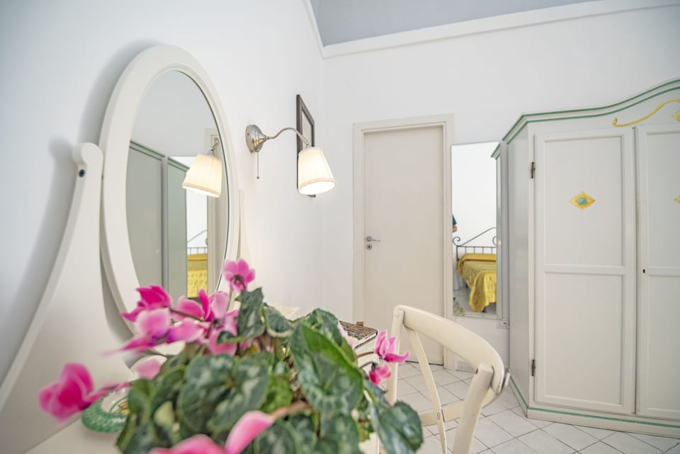 Standard Triple Room, Sea View | Minibar, in-room safe, WiFi (free), bed sheets