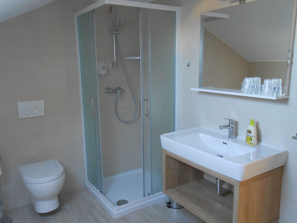 Suite, 2 Bedrooms, Balcony | Bathroom | Shower, free toiletries, hair dryer, towels