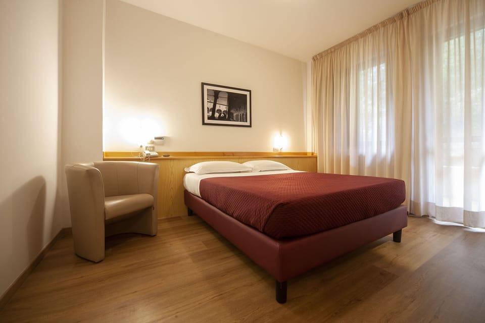Premium bedding, minibar, desk, laptop workspace