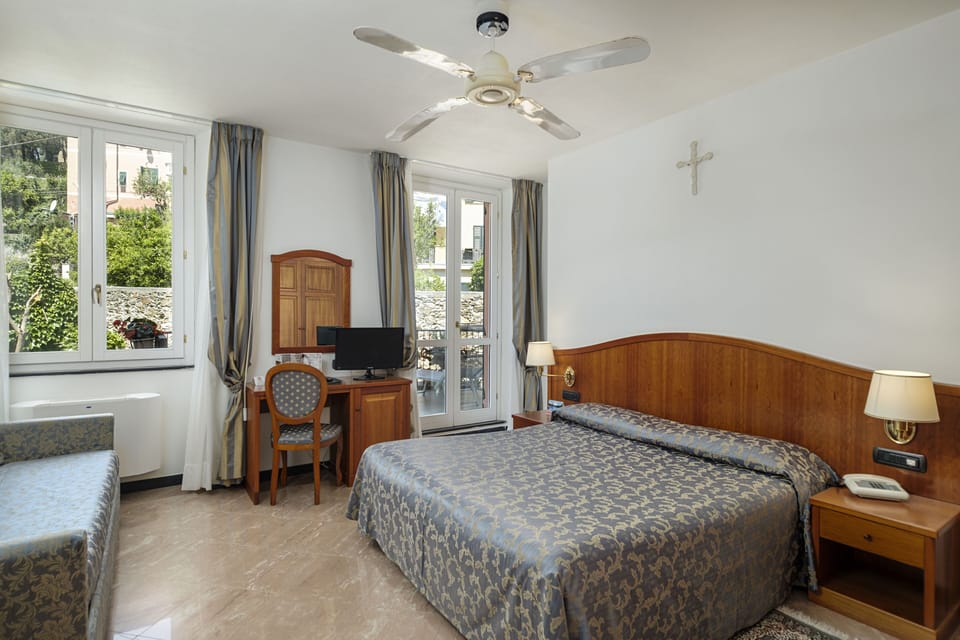 Superior Triple Room | Minibar, in-room safe, desk, free WiFi