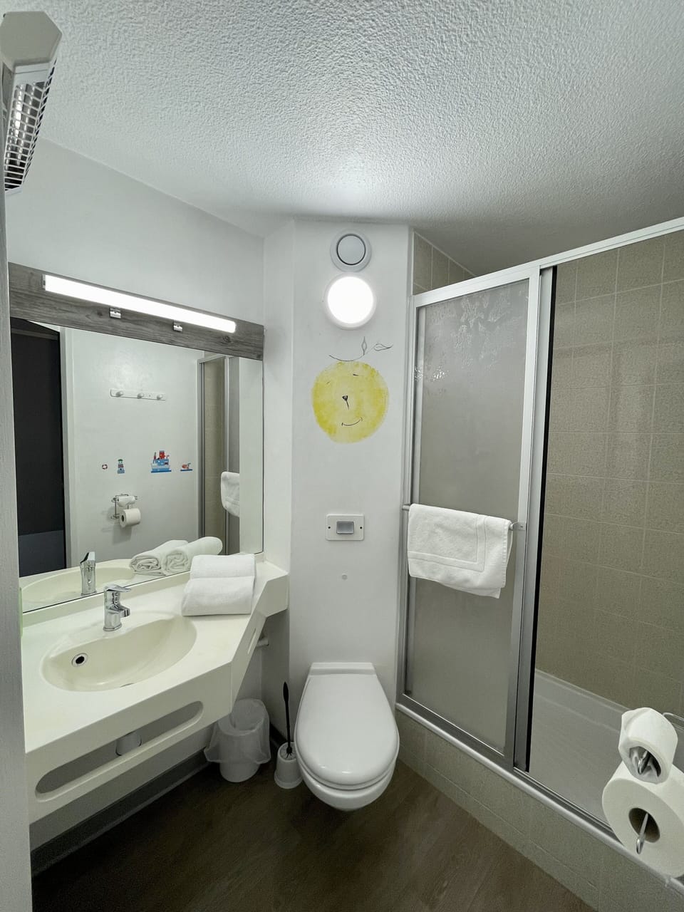 Shower, rainfall showerhead, towels