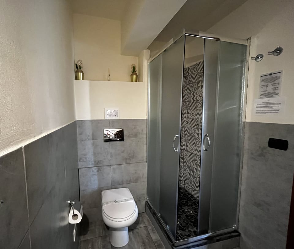 Superior Room, 1 Queen Bed, Balcony, City View | Bathroom | Shower, rainfall showerhead, free toiletries, hair dryer