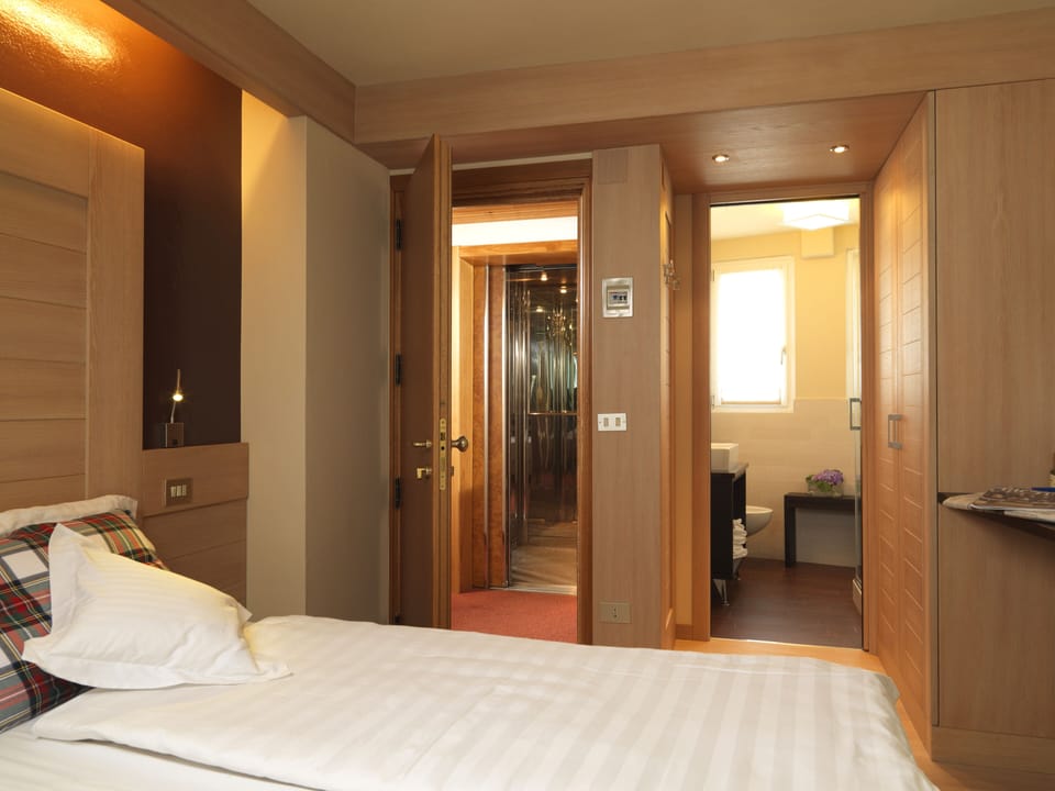 Comfort Double or Twin Room | Frette Italian sheets, Select Comfort beds, in-room safe, desk