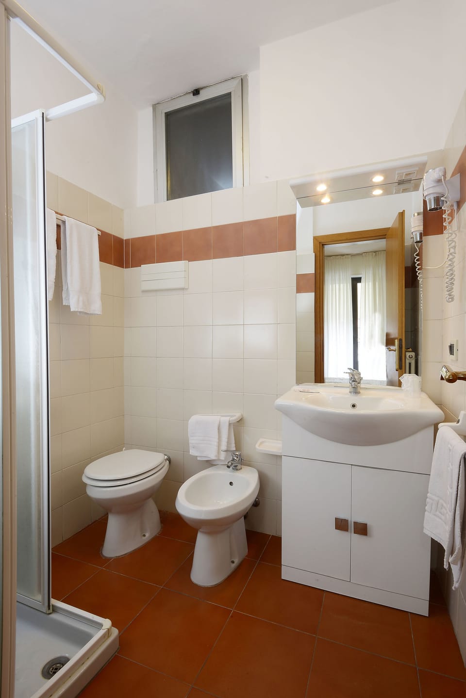 Quadruple Room, Balcony | Bathroom | Shower, hair dryer, towels