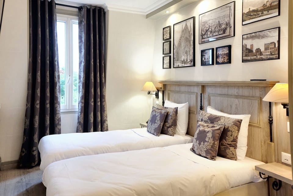 Twin Room | Hypo-allergenic bedding, in-room safe, individually decorated, desk