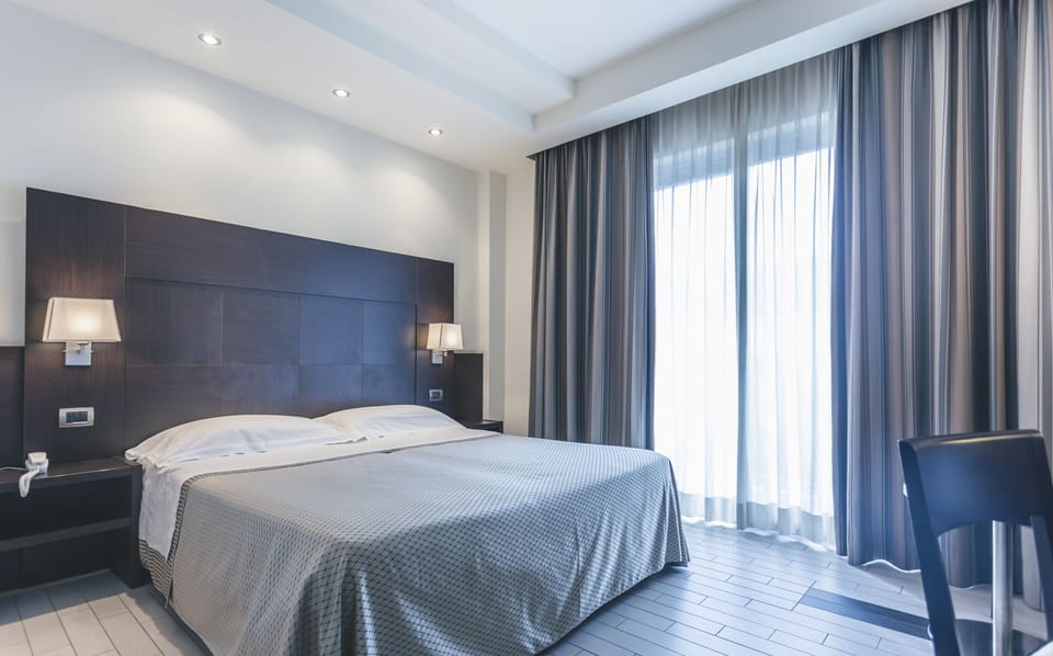 Select Comfort beds, minibar, in-room safe, desk