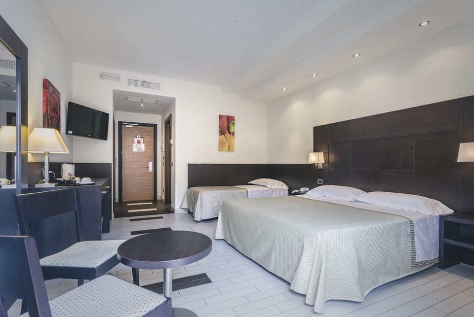 Superior Triple Room | Select Comfort beds, minibar, in-room safe, desk