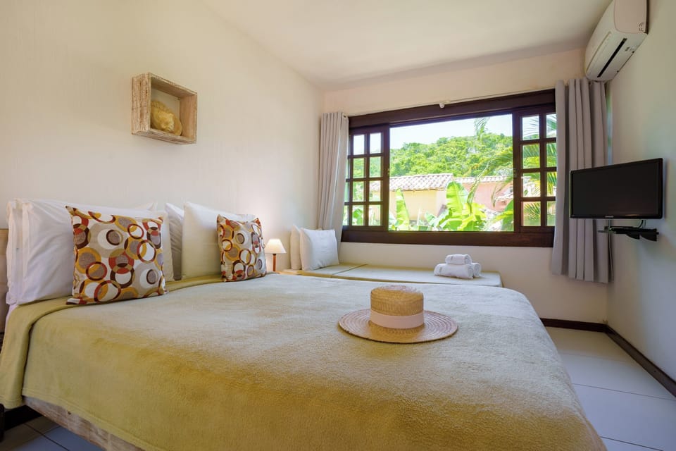Standard Triple Room | Minibar, blackout drapes, iron/ironing board, free WiFi