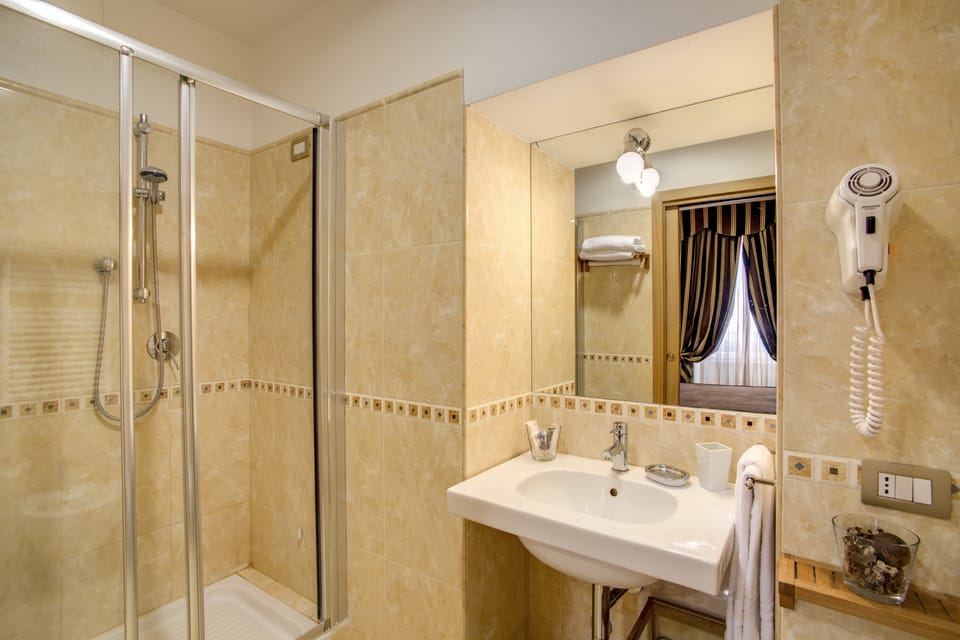 Shower, free toiletries, hair dryer, bidet