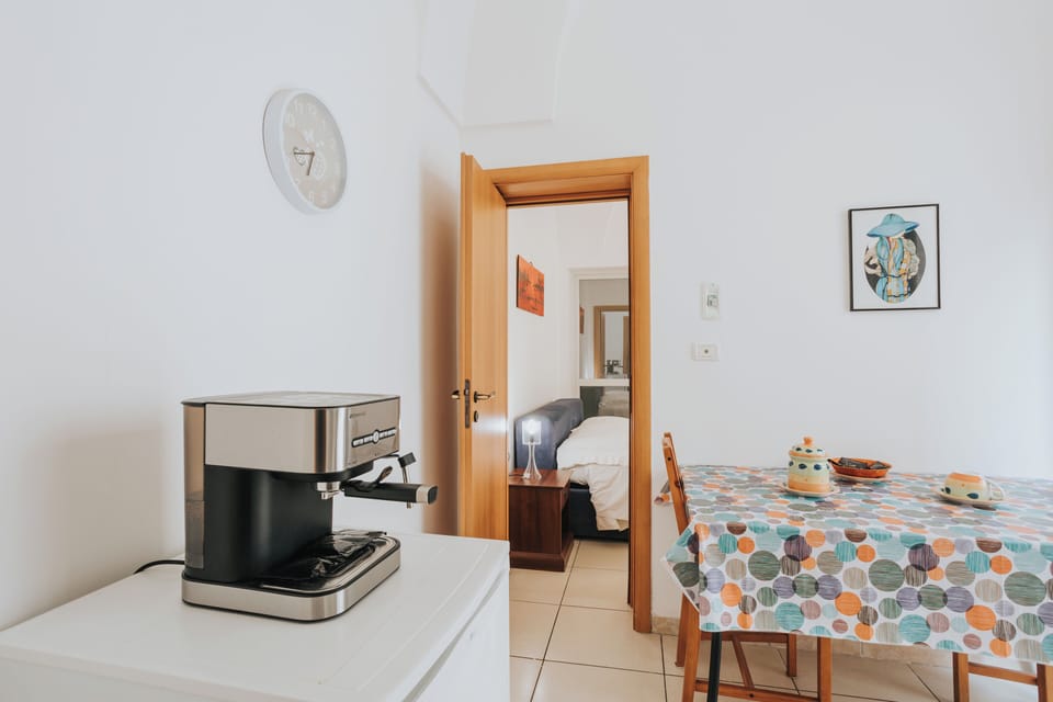 Apartment, 1 Bedroom, Garden View | Private kitchen | Fridge, dining tables
